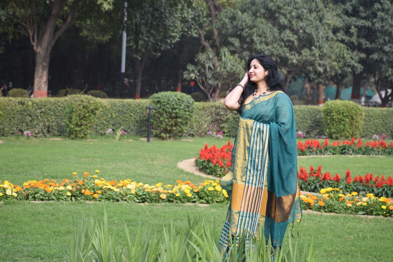 Pure Linen Tissue Saree in Teal Green with Golden Zari Border