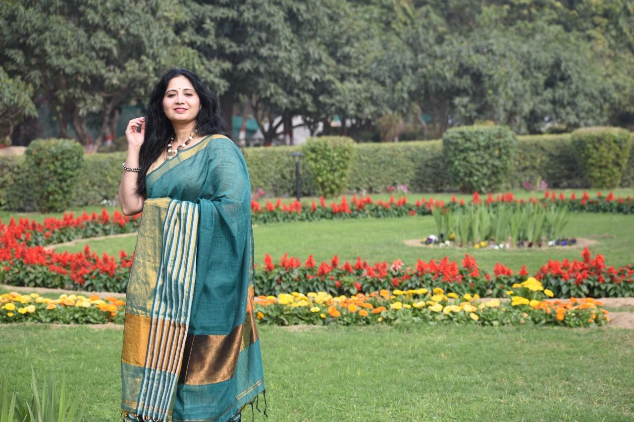 Pure Linen Tissue Saree in Teal Green with Golden Zari Border